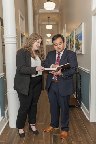 Attorneys reading a book